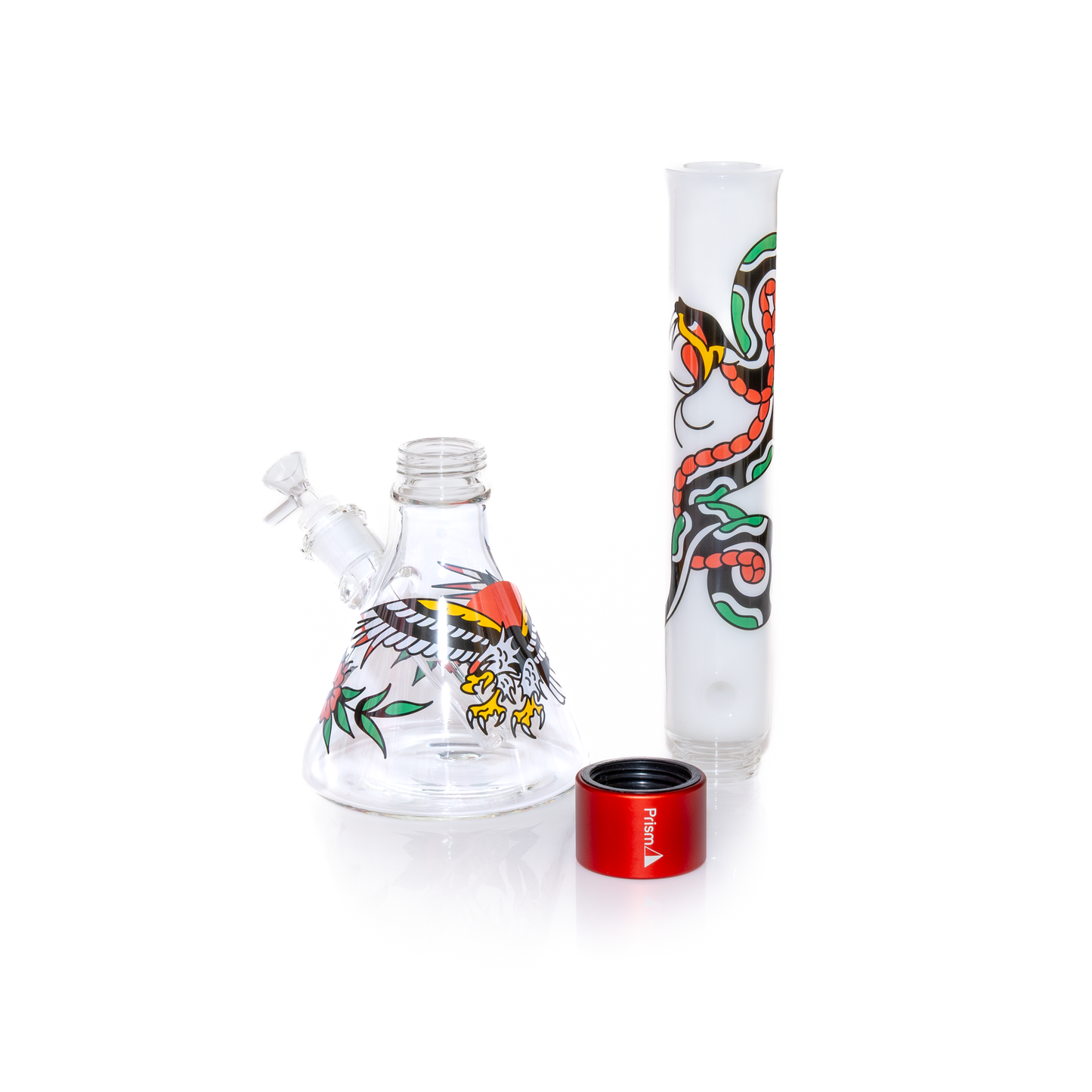 Close-up of the Prism glass system separated into the three parts: the beaker base, red connector, and white Tall mouthpiece. This view highlights the screw-off joint mechanism designed for quick deep cleaning and portability. Features include unique tattoo-style decal artwork (eagle and snake) and durable high-quality thick glass. An excellent portable smoking accessory and a great gift idea.
