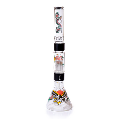 Back view of the full double stack Prism Inked Beaker set-up, featuring the vivid eagle decal and surrounding flowers on the clear glass beaker base. This tall modular glass pipe shows the black anodized aluminum connectors stacked beneath the central Big Tree percolator chamber. This image  highlights the two-stage diffusion and smooth tree percolation. Customizable tree perc setup perfect for your next gift. 
