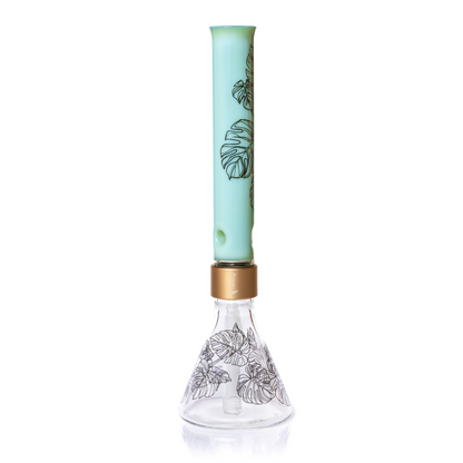 Glass smoking accessory with turquoise top and gold accent on a white background