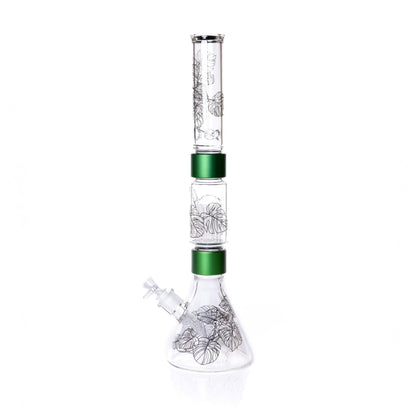 Glass water pipe with green accents on a white background